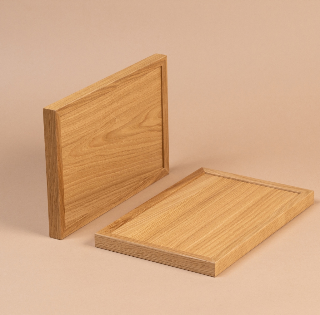 Façade sur mesure pour meubles IKEA avec cadre en bois massif et panneau central en finition bois.